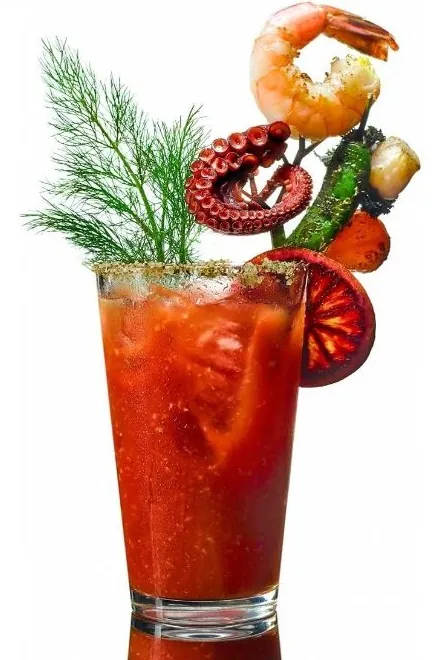 A loaded Bloody Mary garnished with shrimp and grilled octopus